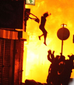 London Riots Woman Jumping